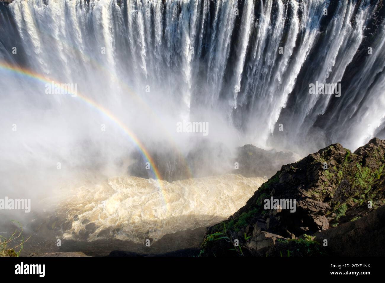 Victoria Falls long Gorge with rainbow. Victoria Falls National ParkZimbabwe, Africa Stock Photo