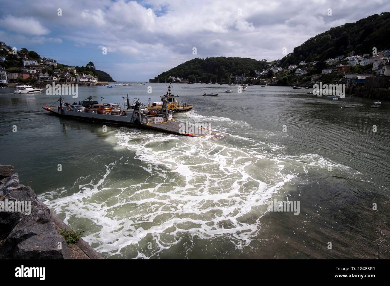 A view of the Dartmouth to Kingswear lower ferry as it leaves the berth in Dartmouth Stock Photo