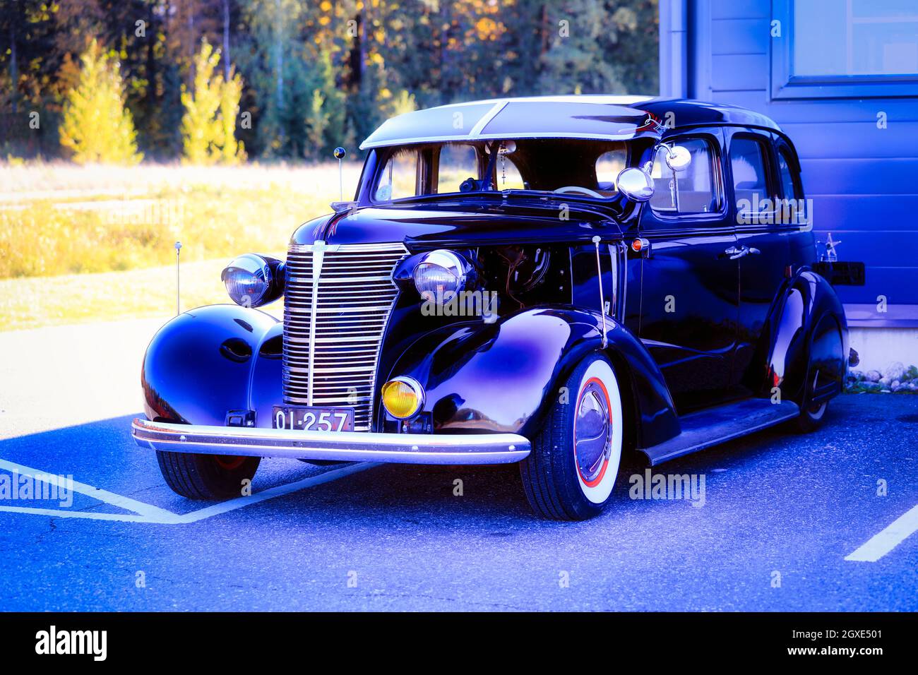 Black late 1930s American classic Chevrolet car parked on public parking lot. Enhanced colour. Salo, Finland. September 26, 2021. Stock Photo