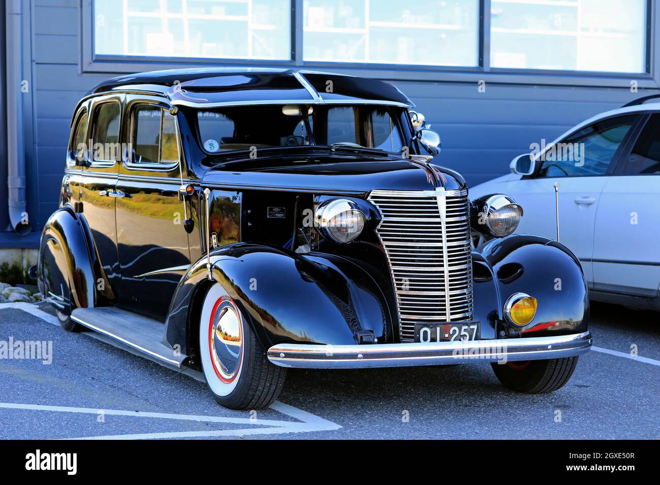 Black late 1930s American classic Chevrolet car parked on public parking lot. Salo, Finland. September 26, 2021. Stock Photo
