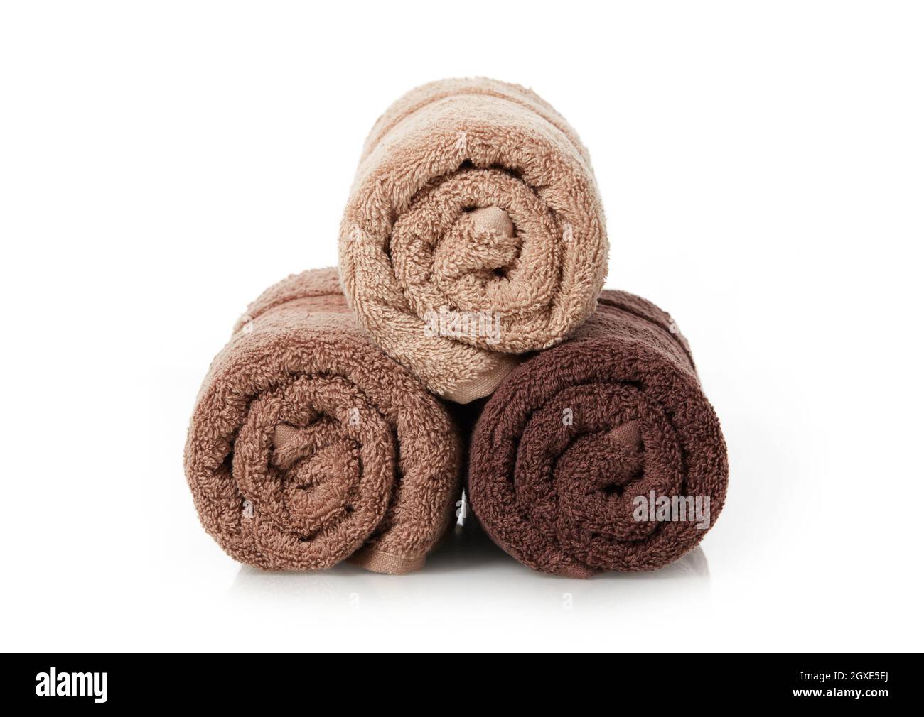 Rolled towels on white background Stock Photo