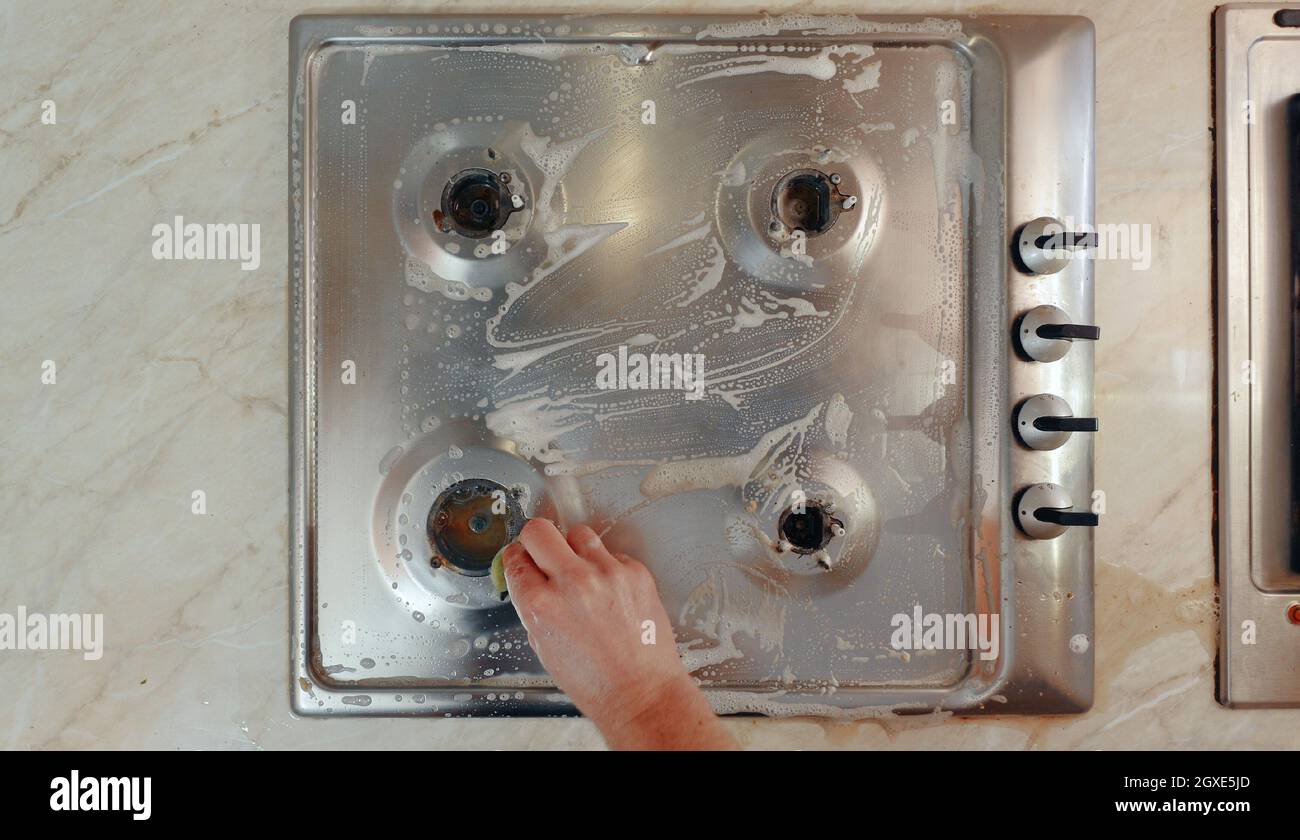 Dirty kitchen stove cooker needs cleaning up Stock Photo Alamy