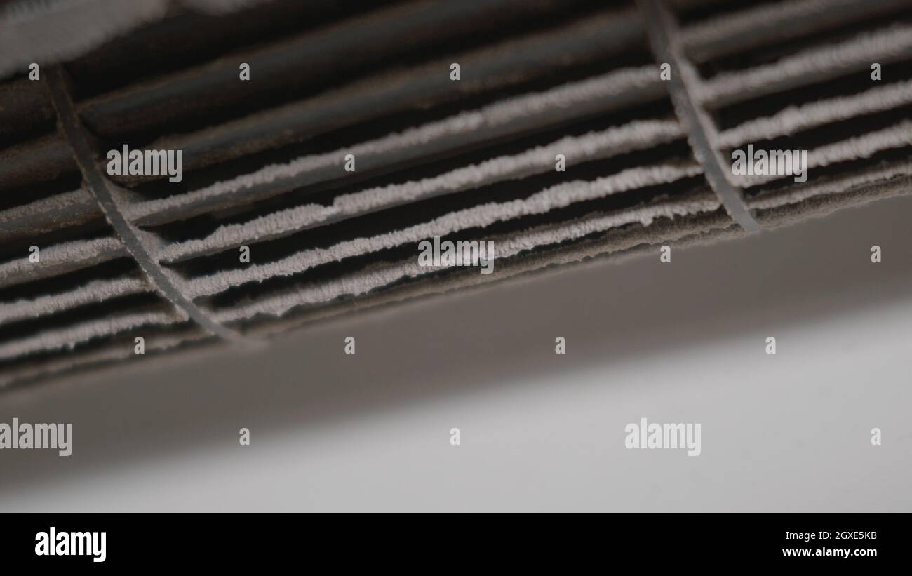 Dirty dust dense on squirrel cage fan in air conditioner indoor at home