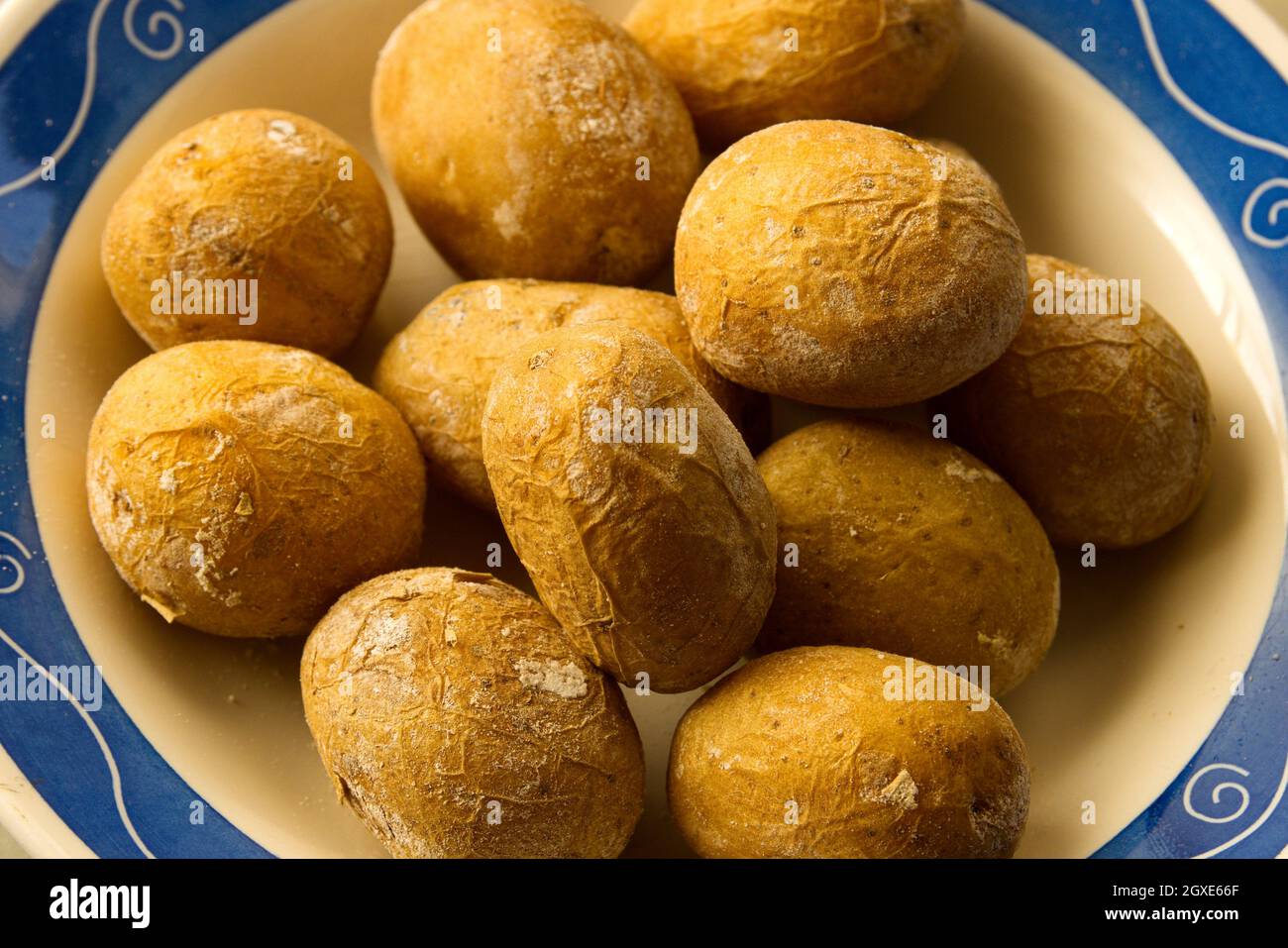 Detail of a "tapa" of Canarian wrinkled potatoes, a typical snack from the Canary Islands in Spain Stock Photo