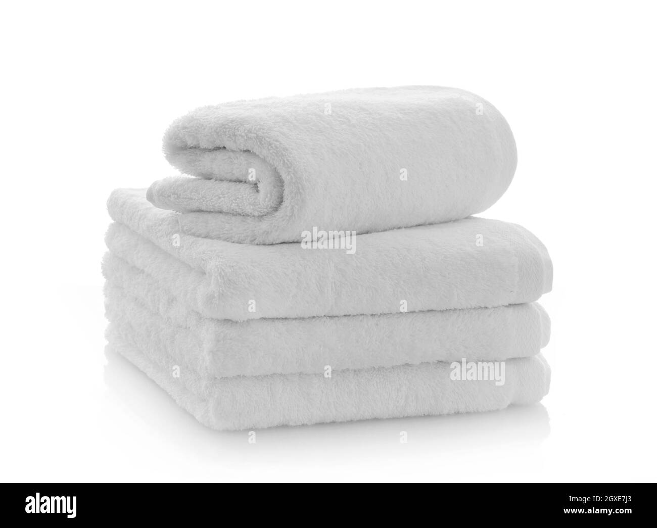 Clean new towels on white background Stock Photo