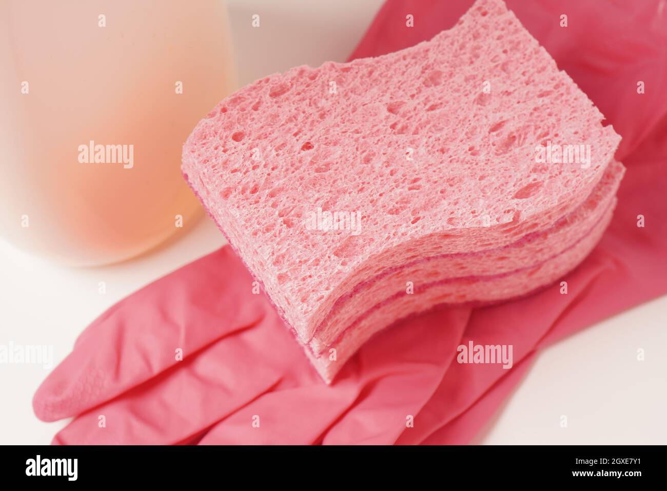 Sponges and rubber cloves for washing dishes and other domestic needs Stock Photo