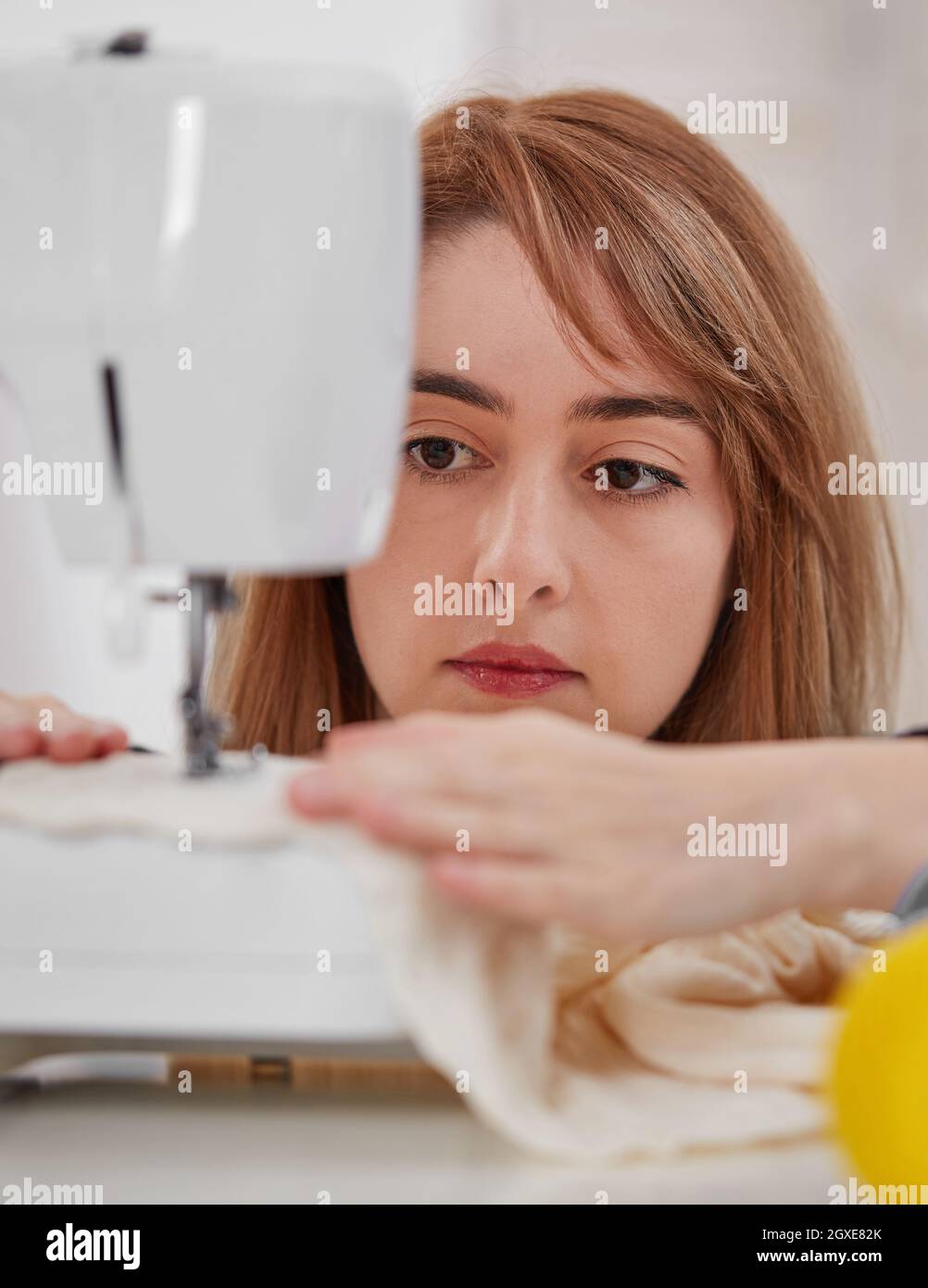 Seamstress woman in Stock Photo Alamy