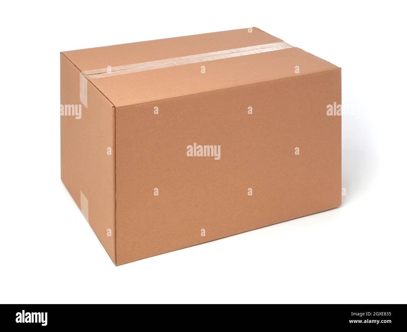Closed cardboard box on white background Stock Photo