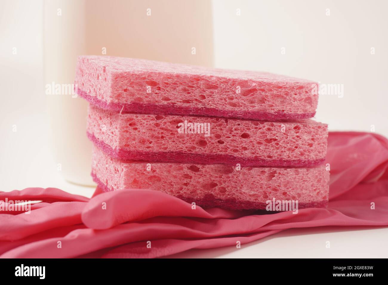 Sponges and rubber cloves for washing dishes and other domestic needs Stock Photo