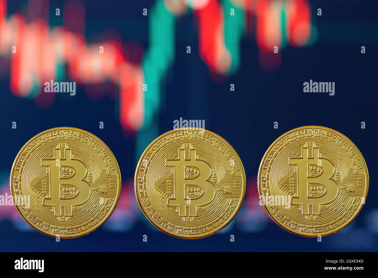 Bitcoin, new Virtual money concept. Gold bitcoins with Candle stick graph chart and digital background. Golden coin with icon letter B. Mining or bloc Stock Photo