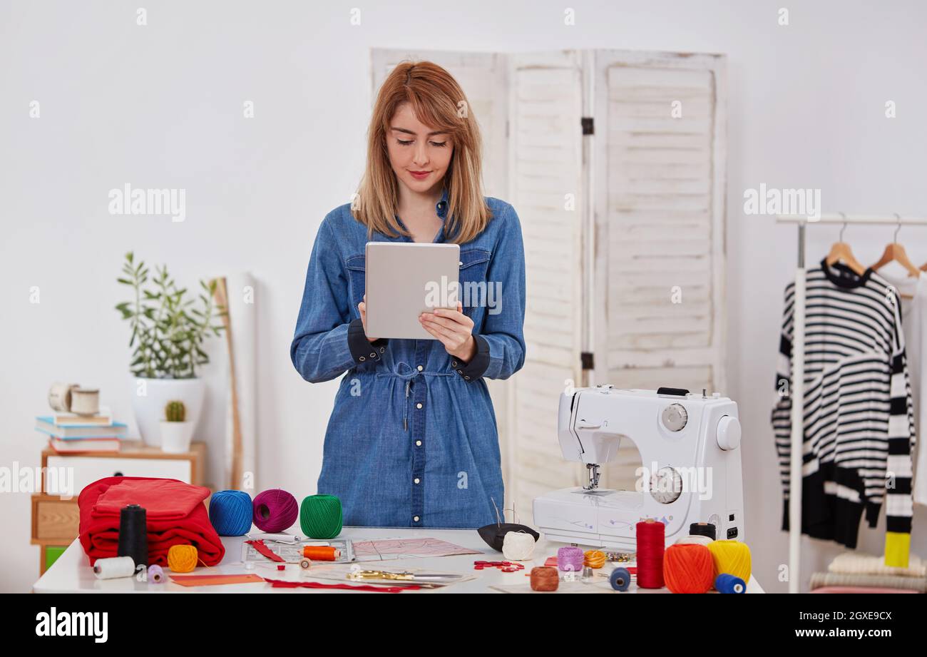 Seamstress woman in workshop Stock Photo