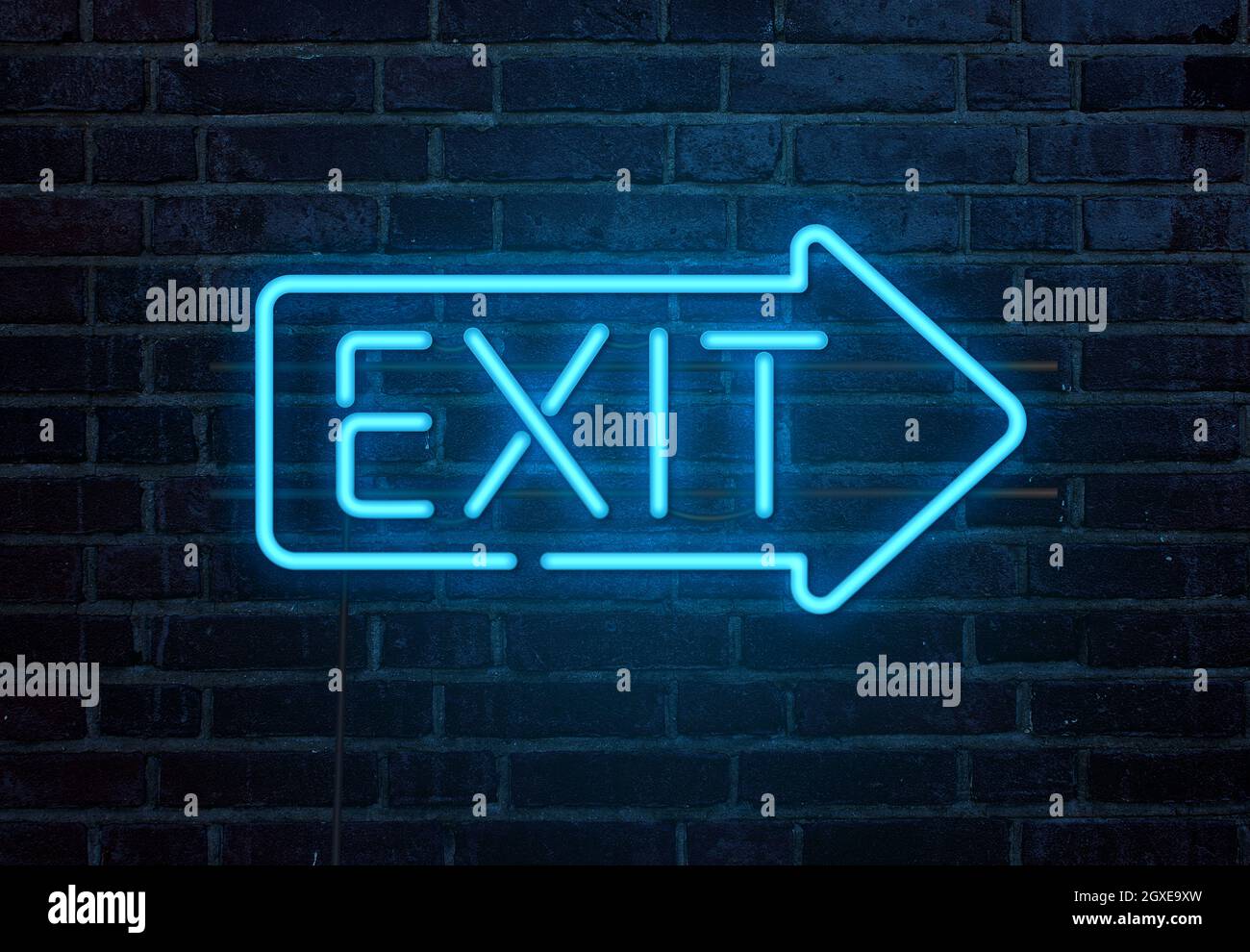 Exit neon sign on brick wall Stock Photo