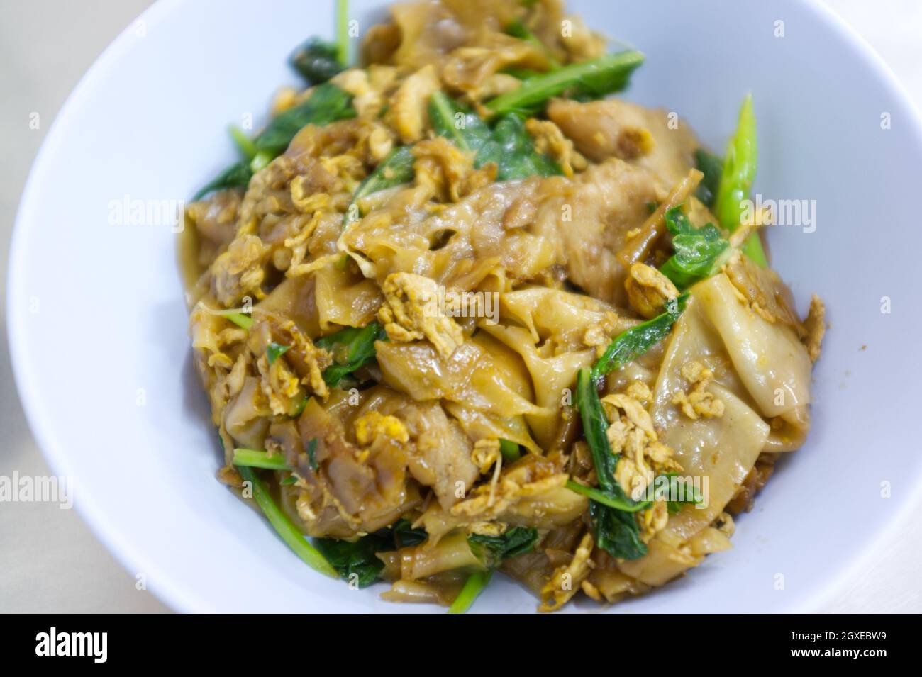 Stir-fried Rice Noodles with Soy Sauce and Pork Stock Photo - Alamy