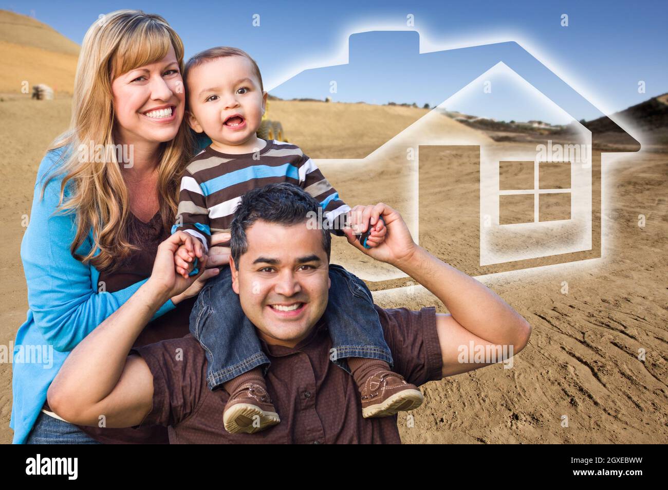 Happy Hopeful Mixed Race Family at Construction Site with Ghosted House Behind. Stock Photo