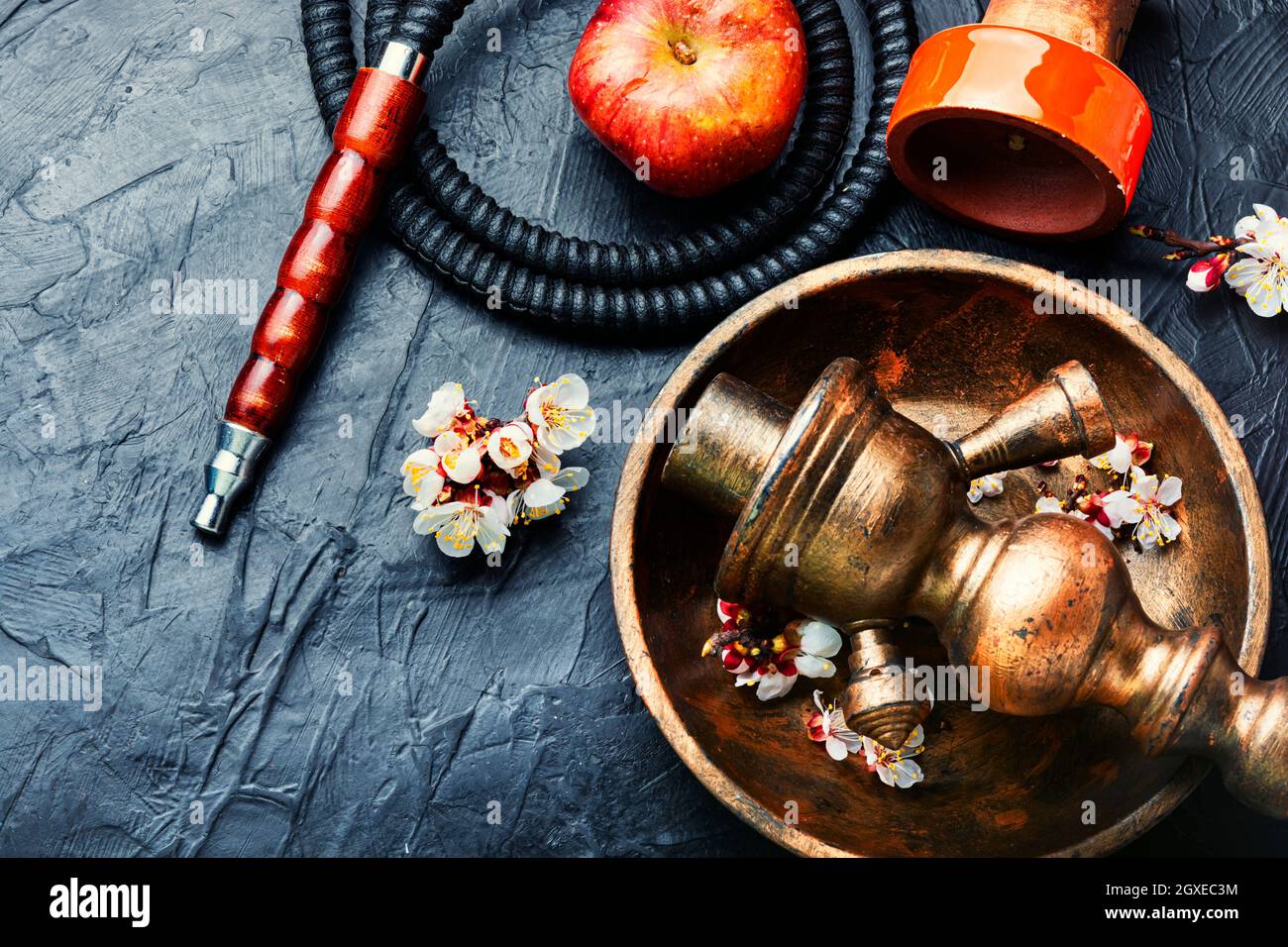 Modern shisha hookah on tobacco with apple tasty.Apple shisha.Smoking a hookah Stock Photo