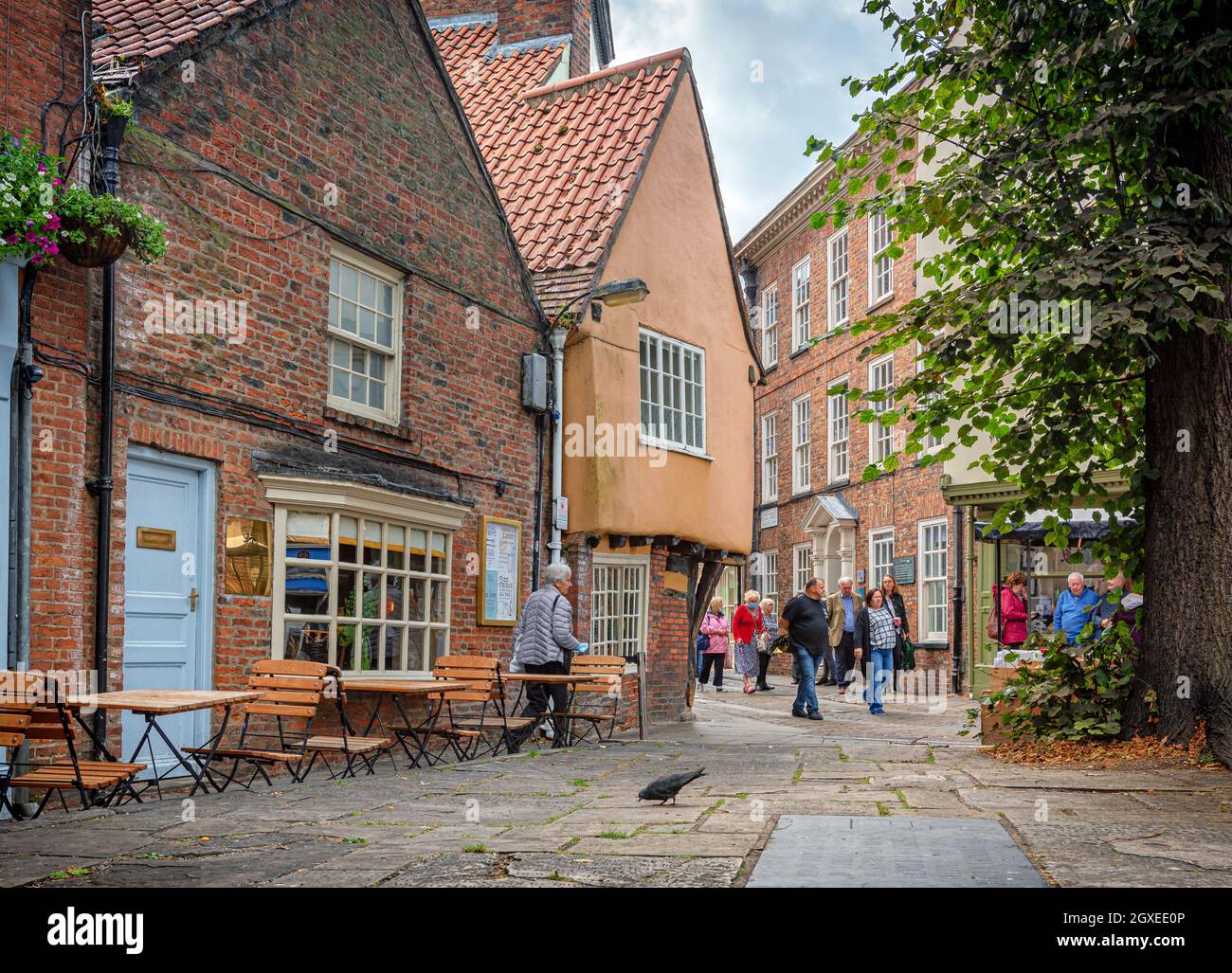 A quaint medieval building with its old wooden rafters showing set in a ...