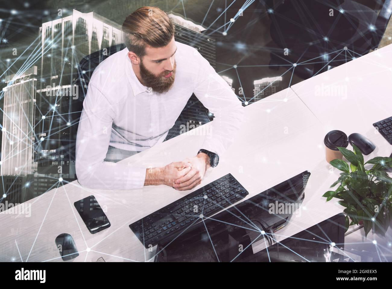 Businessman in office connected on internet network with a computer ...