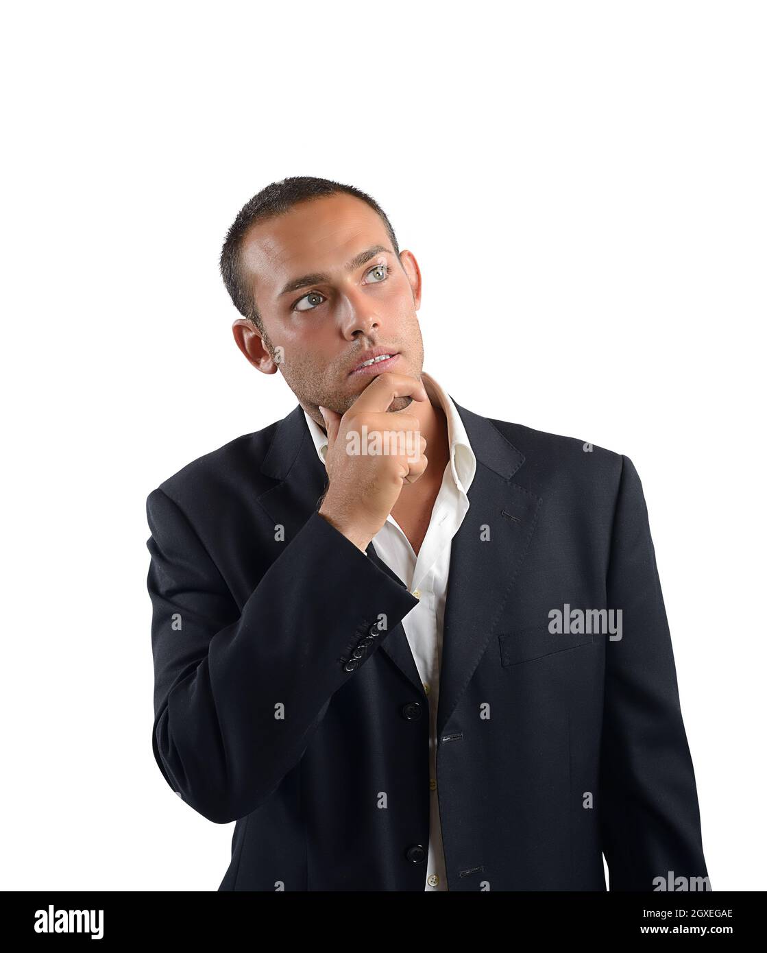 Businessman reflects on what decision to take Stock Photo