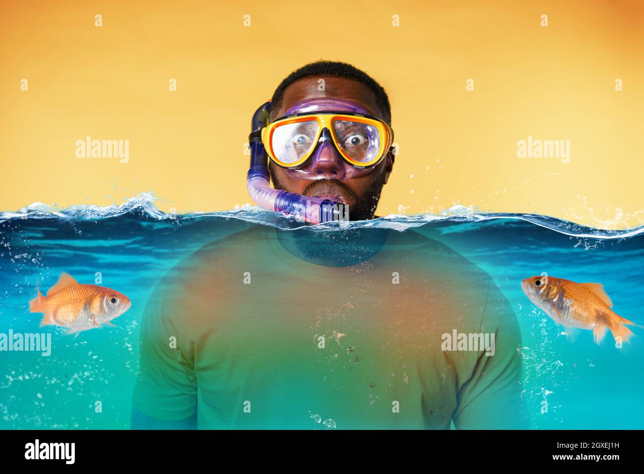Man with snorkeling mask is scared to go underwater Stock Photo Alamy