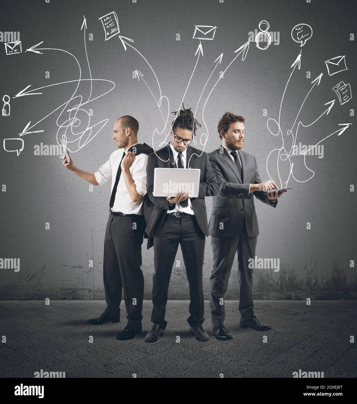 Technology is essential to work for businesspeople Stock Photo - Alamy