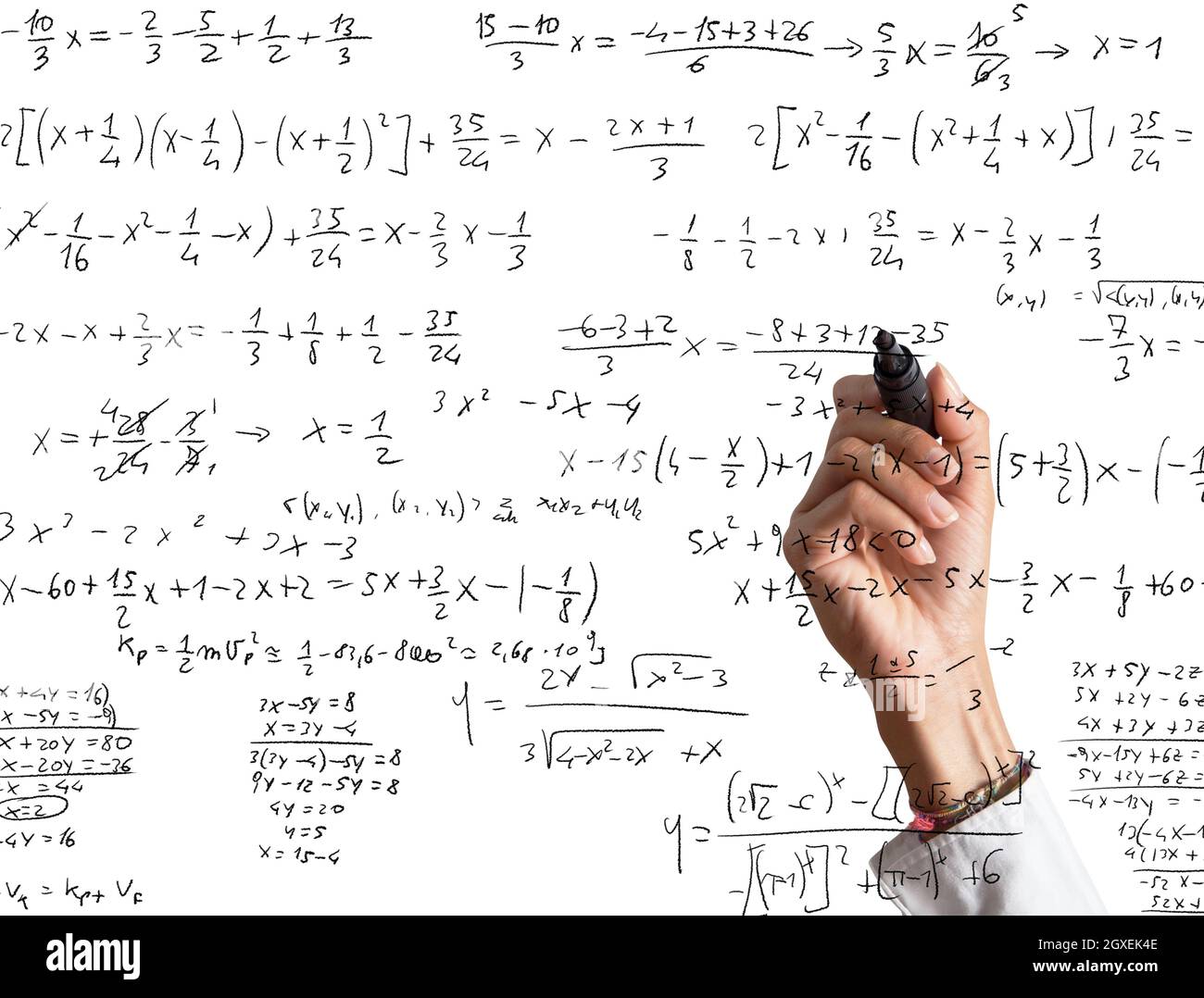 Woman explains and solves a mathematical calculation Stock Photo - Alamy