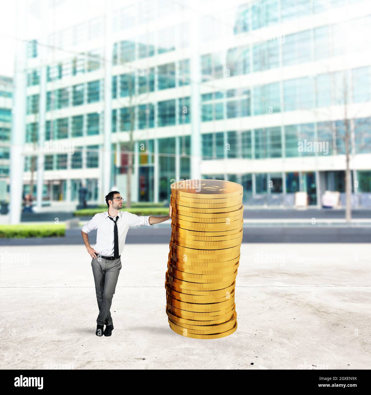 Successful businessman with a pile of golden money Stock Photo - Alamy