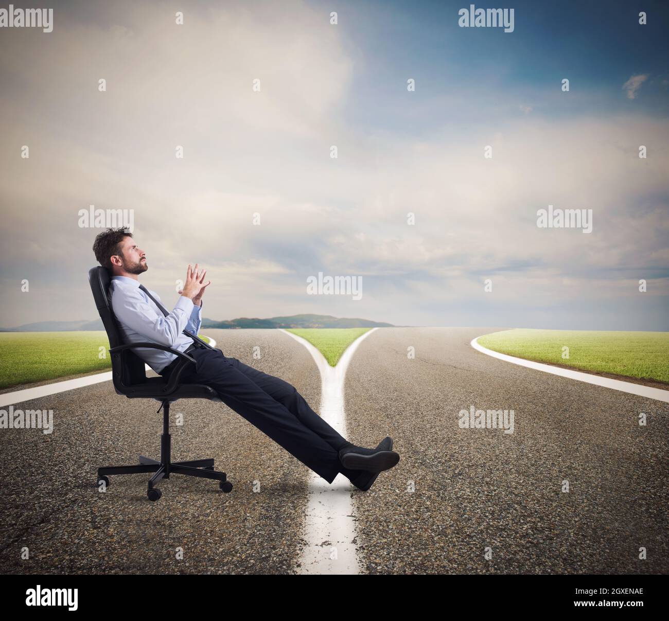 Confused businessman at a crossroads. concept of difficult choice and confusion Stock Photo
