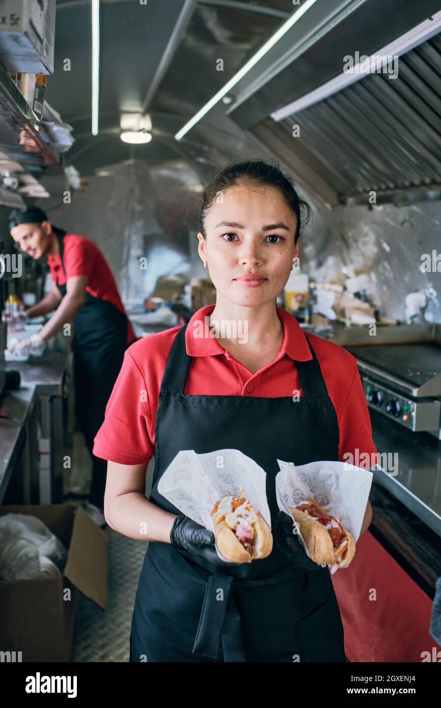 Fastfood female hires stock photography and images Alamy