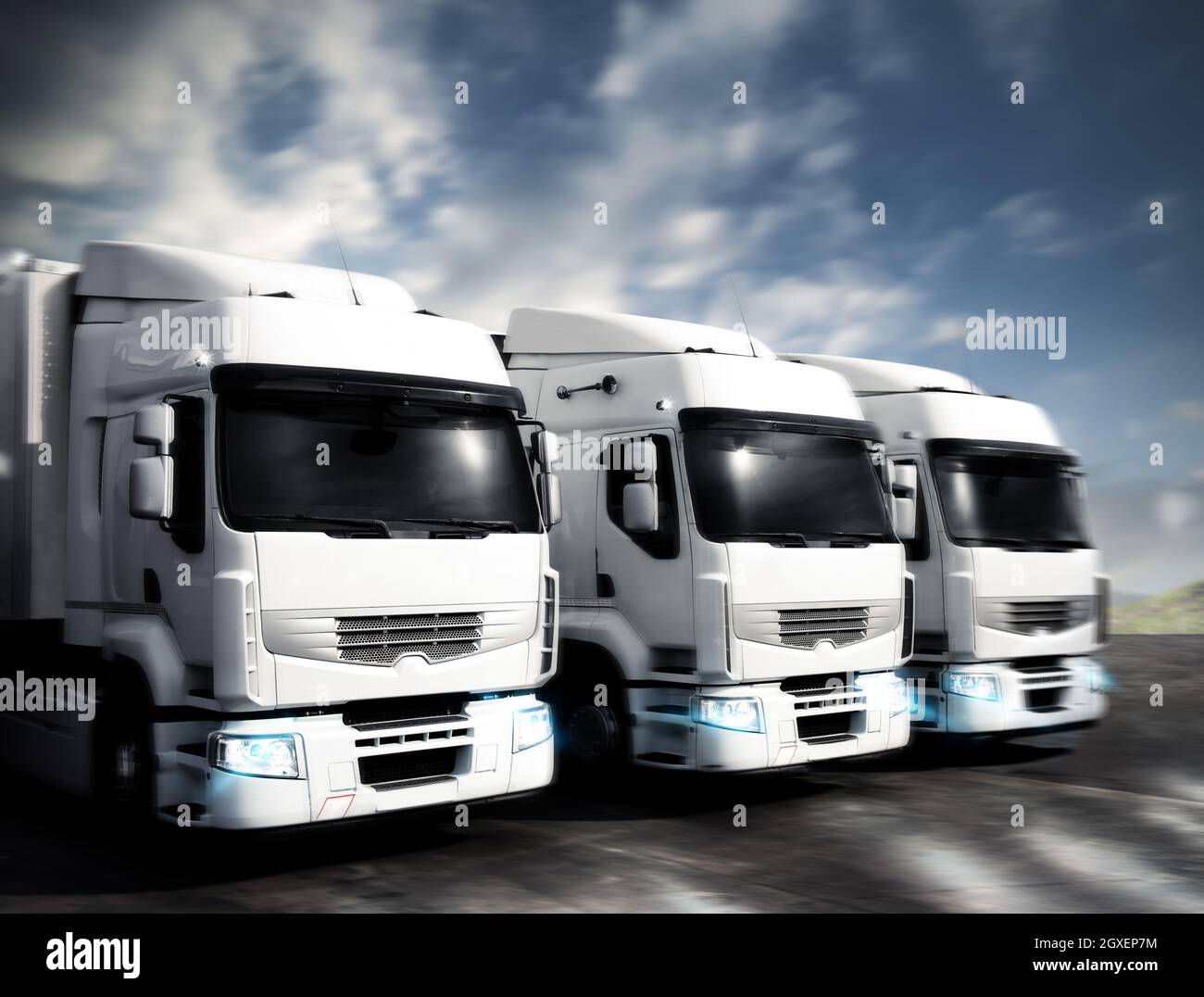 Three white articulated trucks on the road Stock Photo Alamy