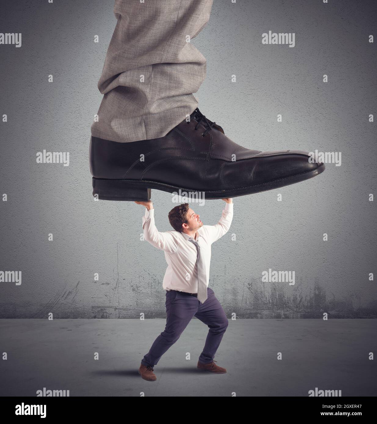Employed crushed by his boss at work Stock Photo Alamy