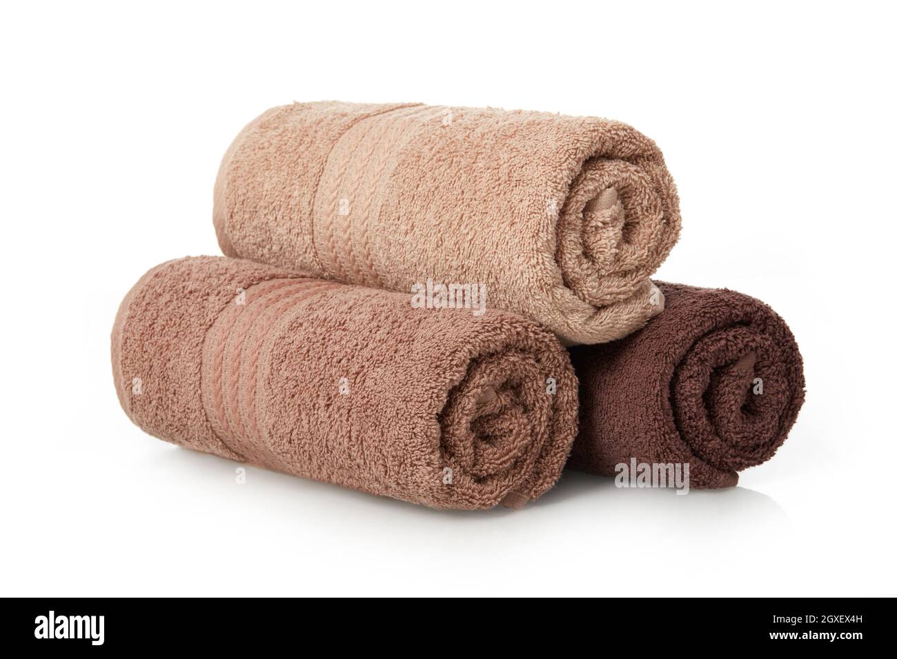 Rolled towels on white background Stock Photo