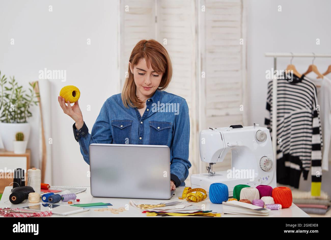 Seamstress woman in workshop Stock Photo
