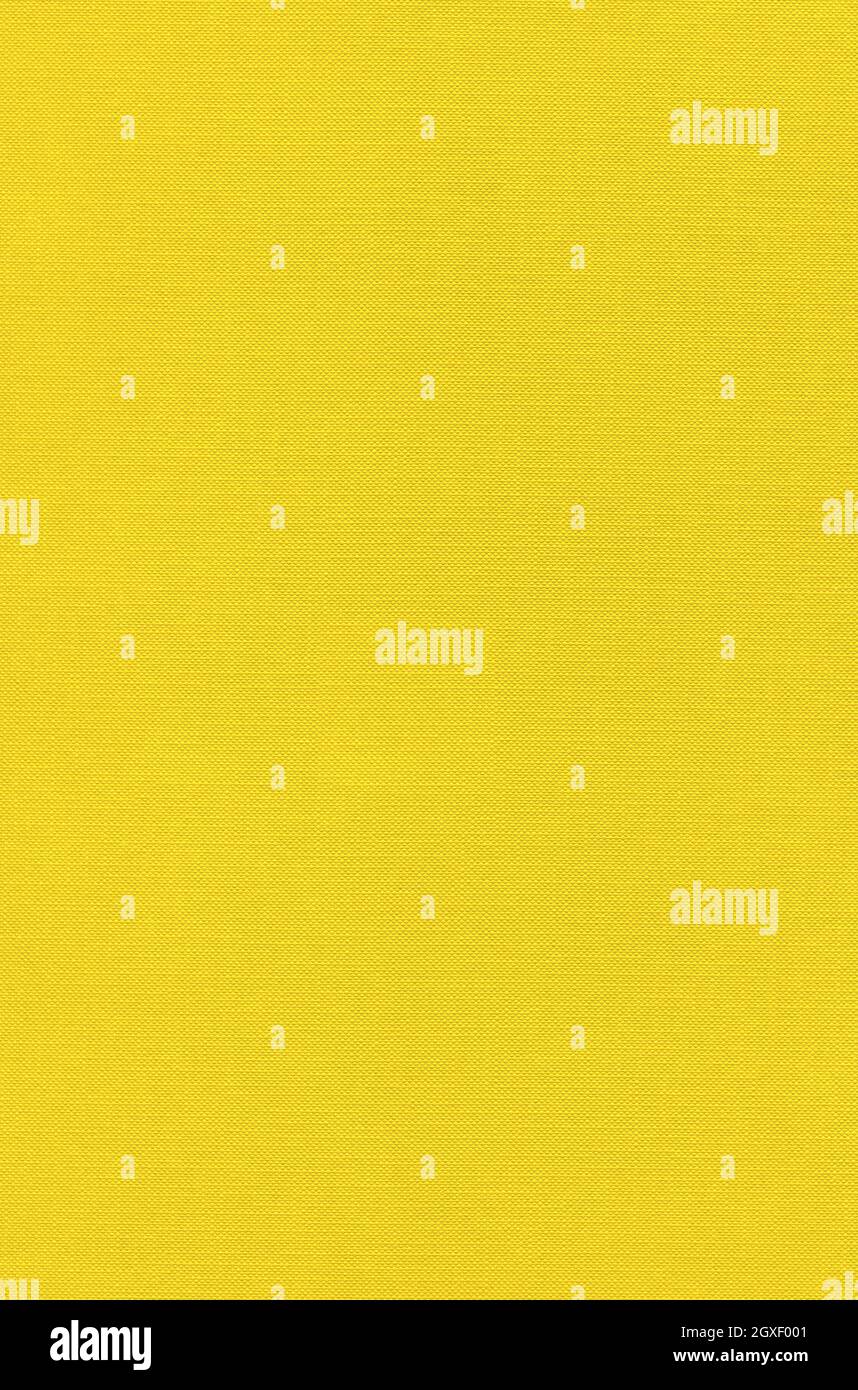 Yellow canvas texture background. Clean fabric wallpaper Stock Photo
