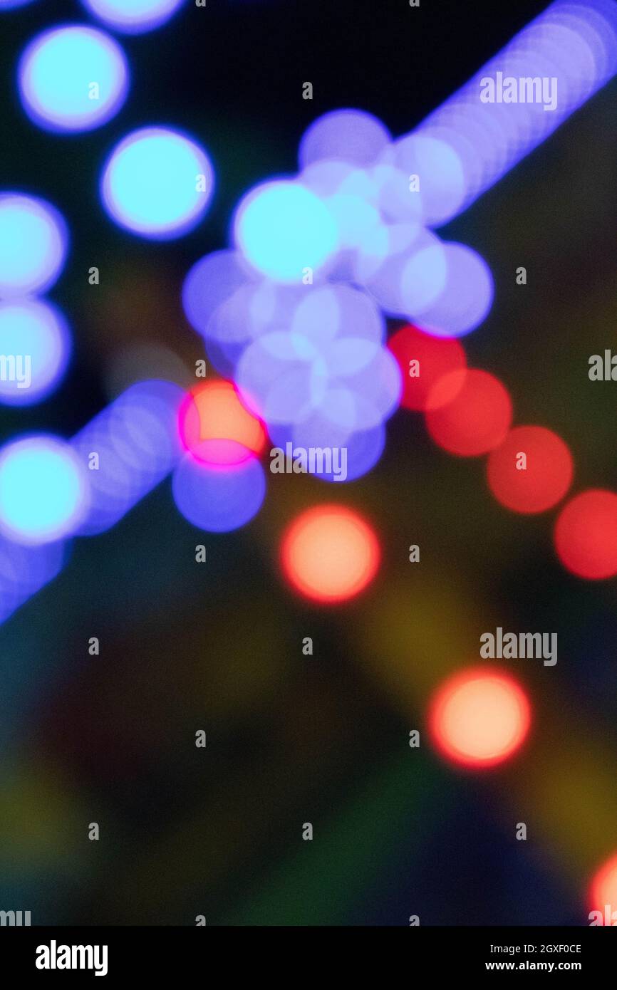 defocused background with colored lights at night 24Mpx Stock Photo