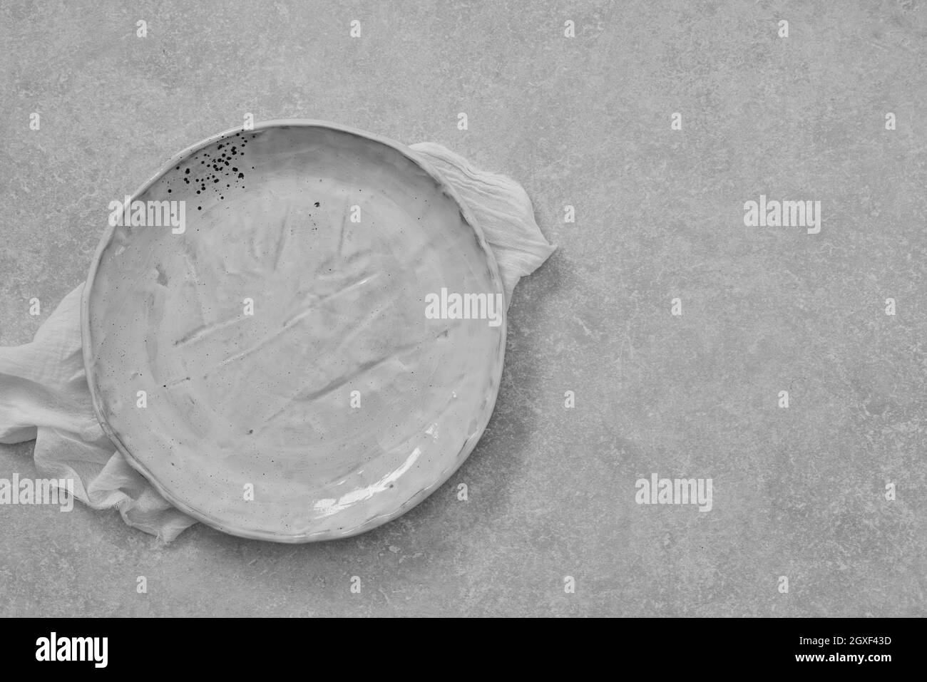 Empty plate on white table Stock Photo