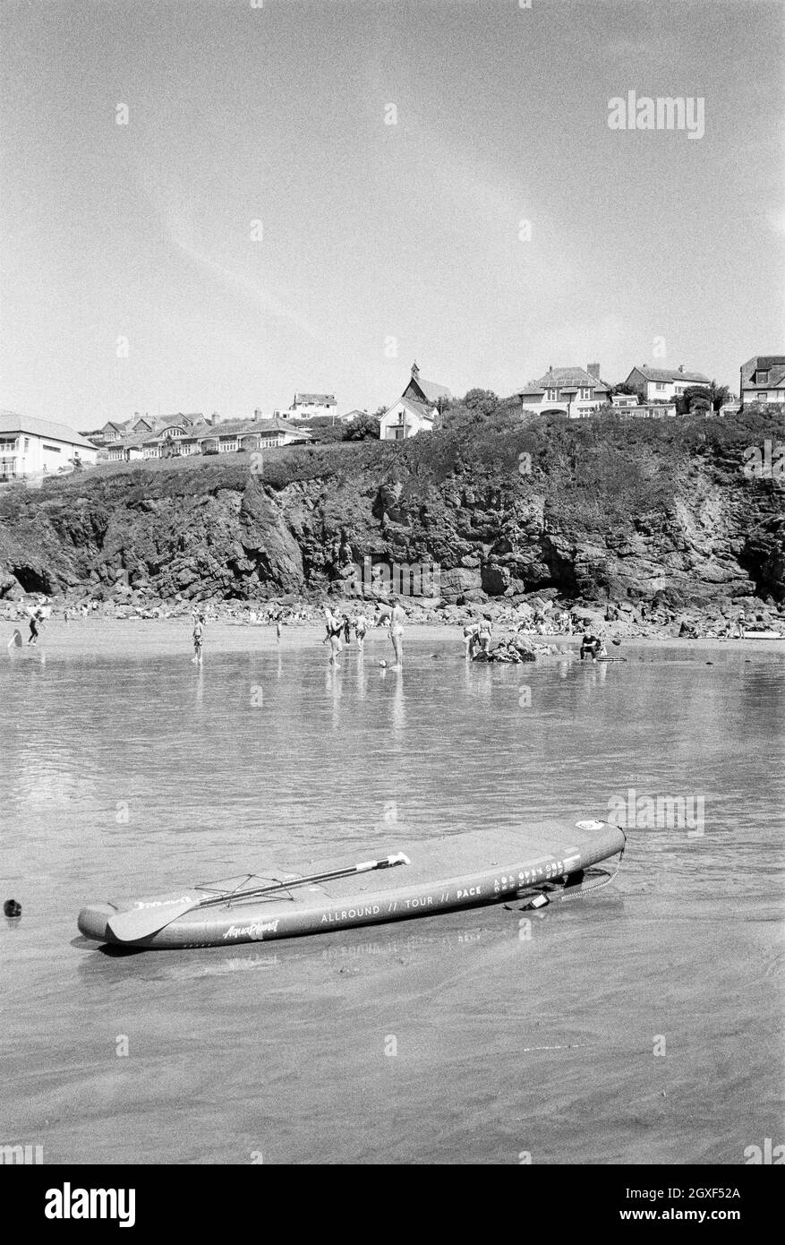 Paddle board on Hope Cove beach, Kingsbridge, Devon, England, United