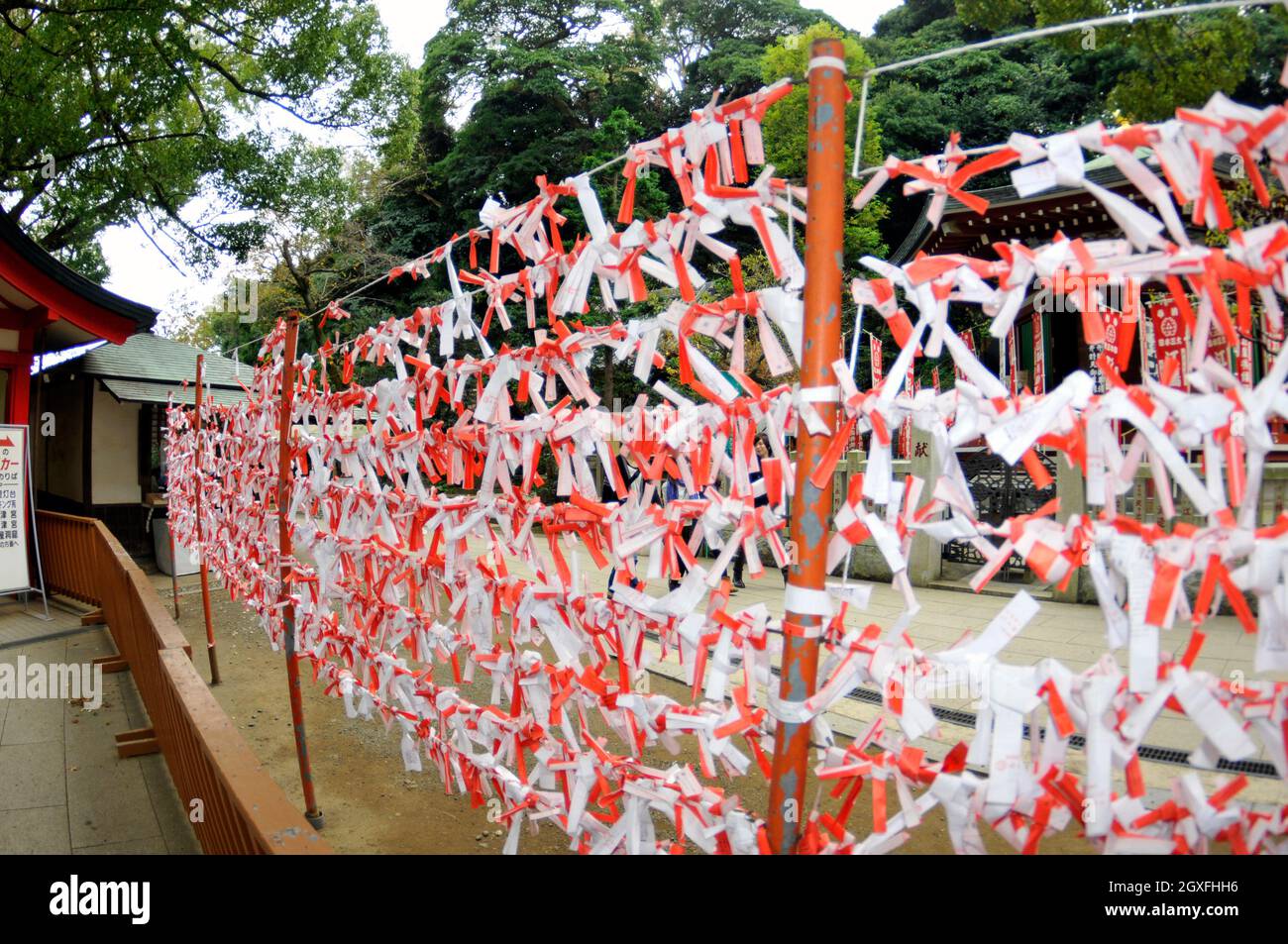 Papers with prayers and wishes in the Enoshima Shrine, Enoshima, Japan Stock Photo