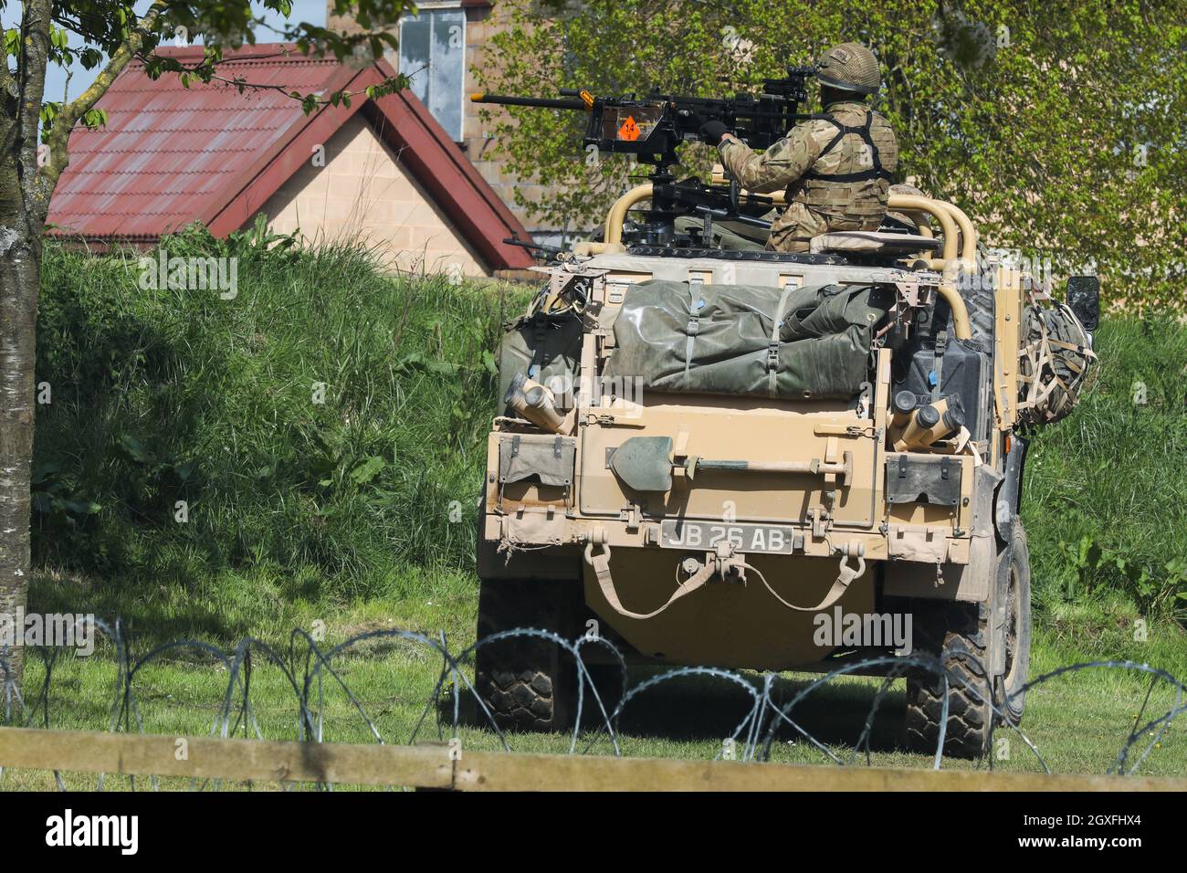 Paratroopers from the 3rd Battalion The Parachute Regiment practicing fighting in built up areas in a purpose built 'village' on Salisbury Plain Stock Photo