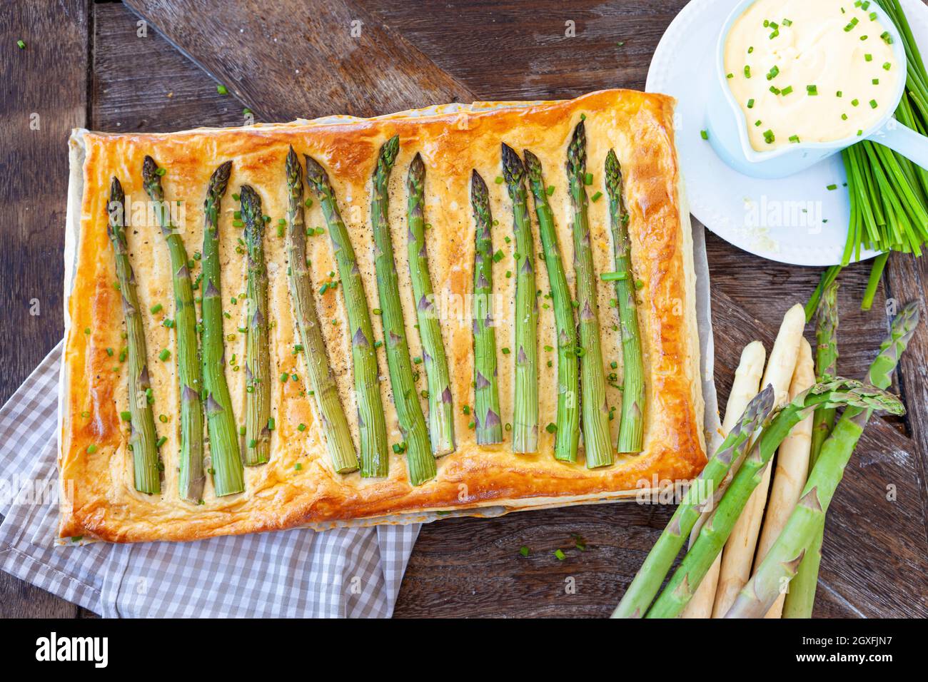 Savory puff pastry quiche with green asparagus Stock Photo Alamy