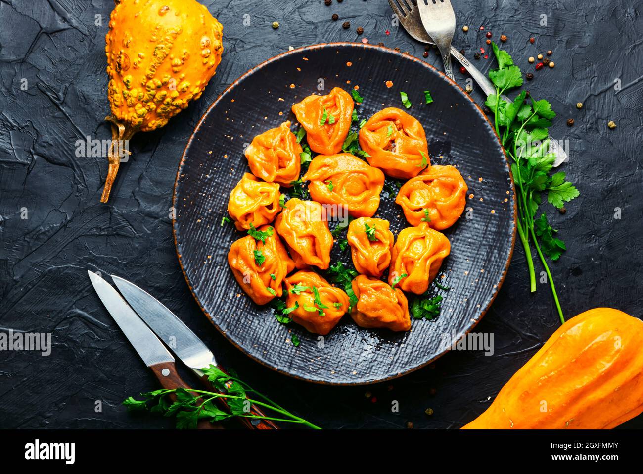 Steamed dumplings or manti with pumpkin.Kazakh manti with pumpkin