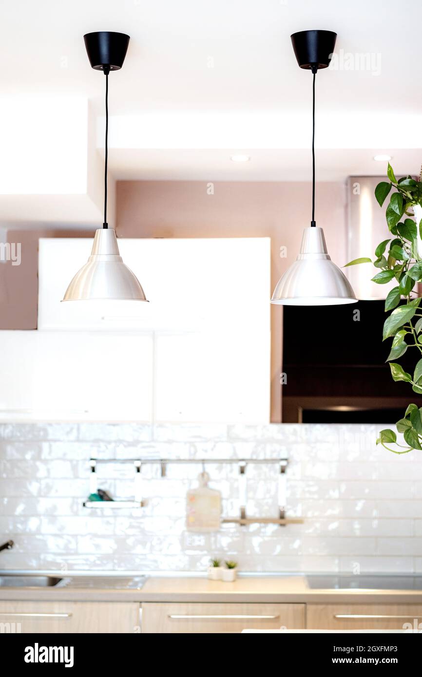 View of a modern white kitchen interior vertical orientation Stock ...