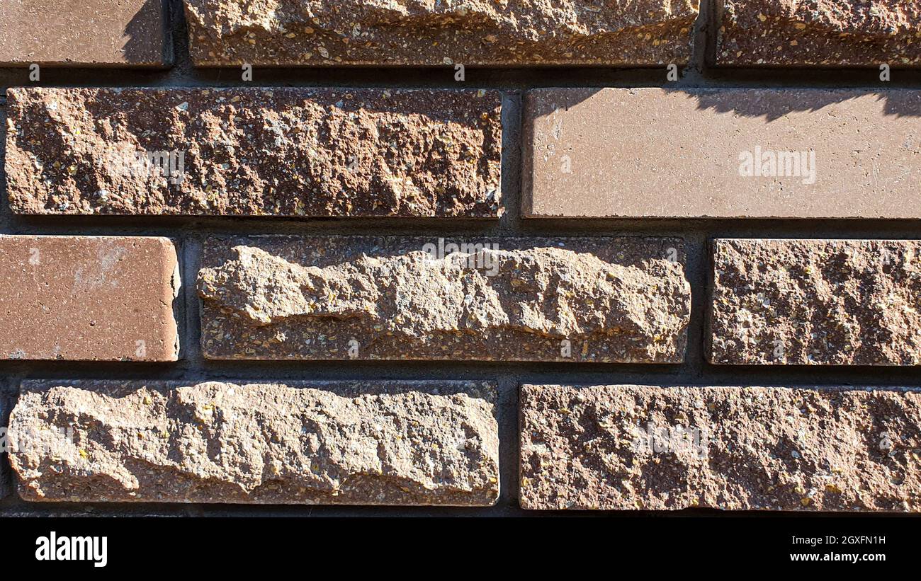 Wall and floor masonry. Various stone textures. Multicolored background. Selective focus. Stock Photo
