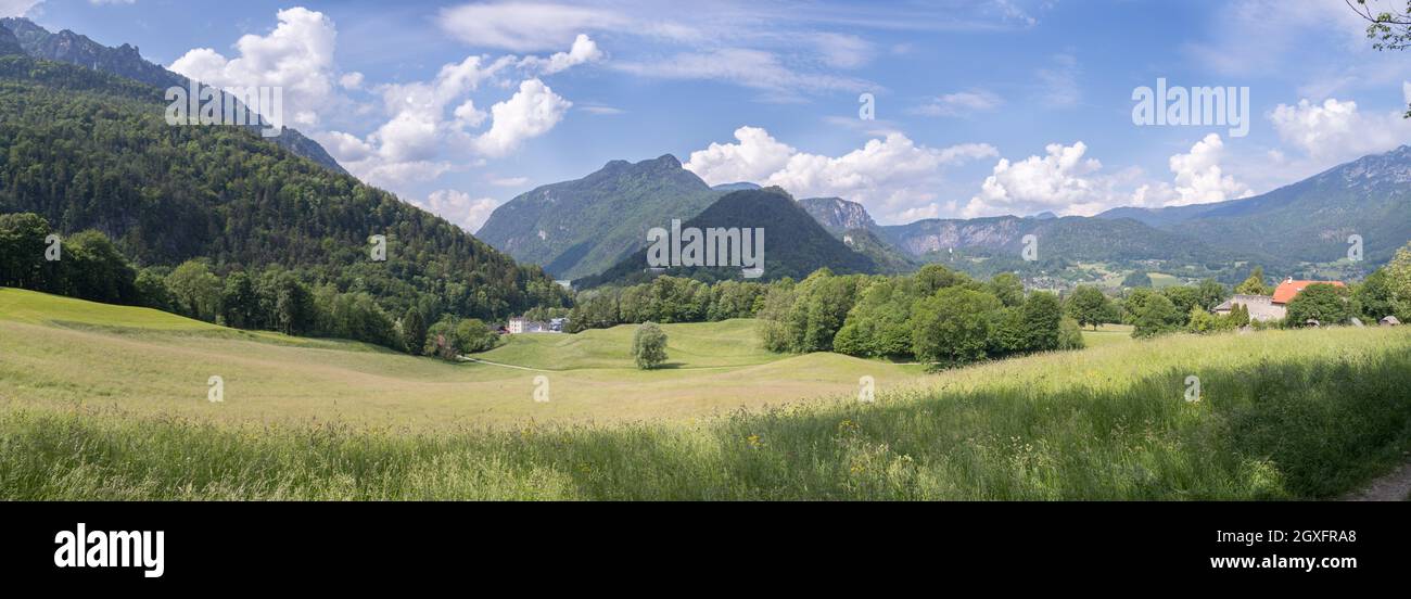Panorama of mountains, sky and meadow in Bavaria near Bad Reichenhall, Germany Stock Photo