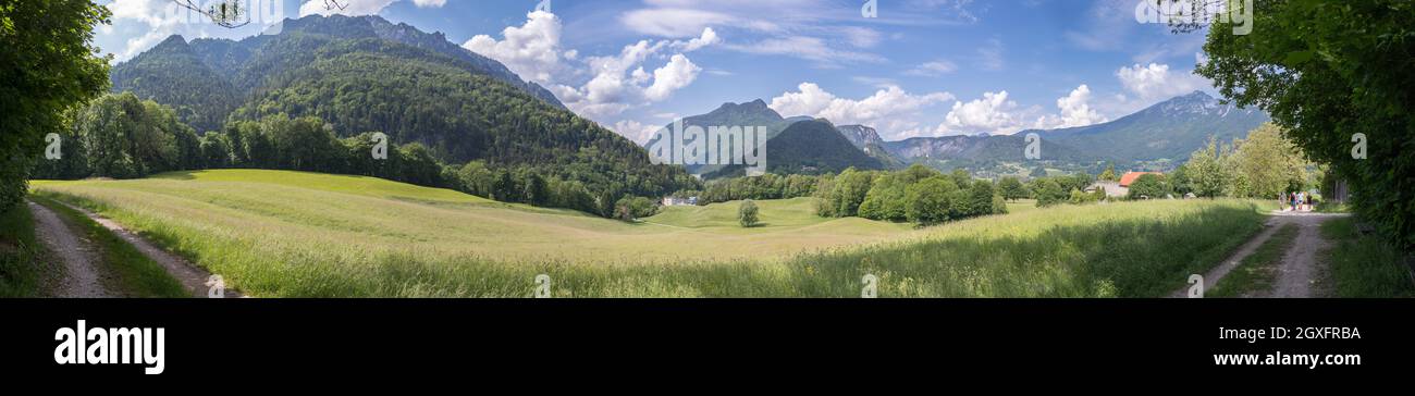 Panorama of mountains, sky and meadow in Bavaria near Bad Reichenhall, Germany Stock Photo