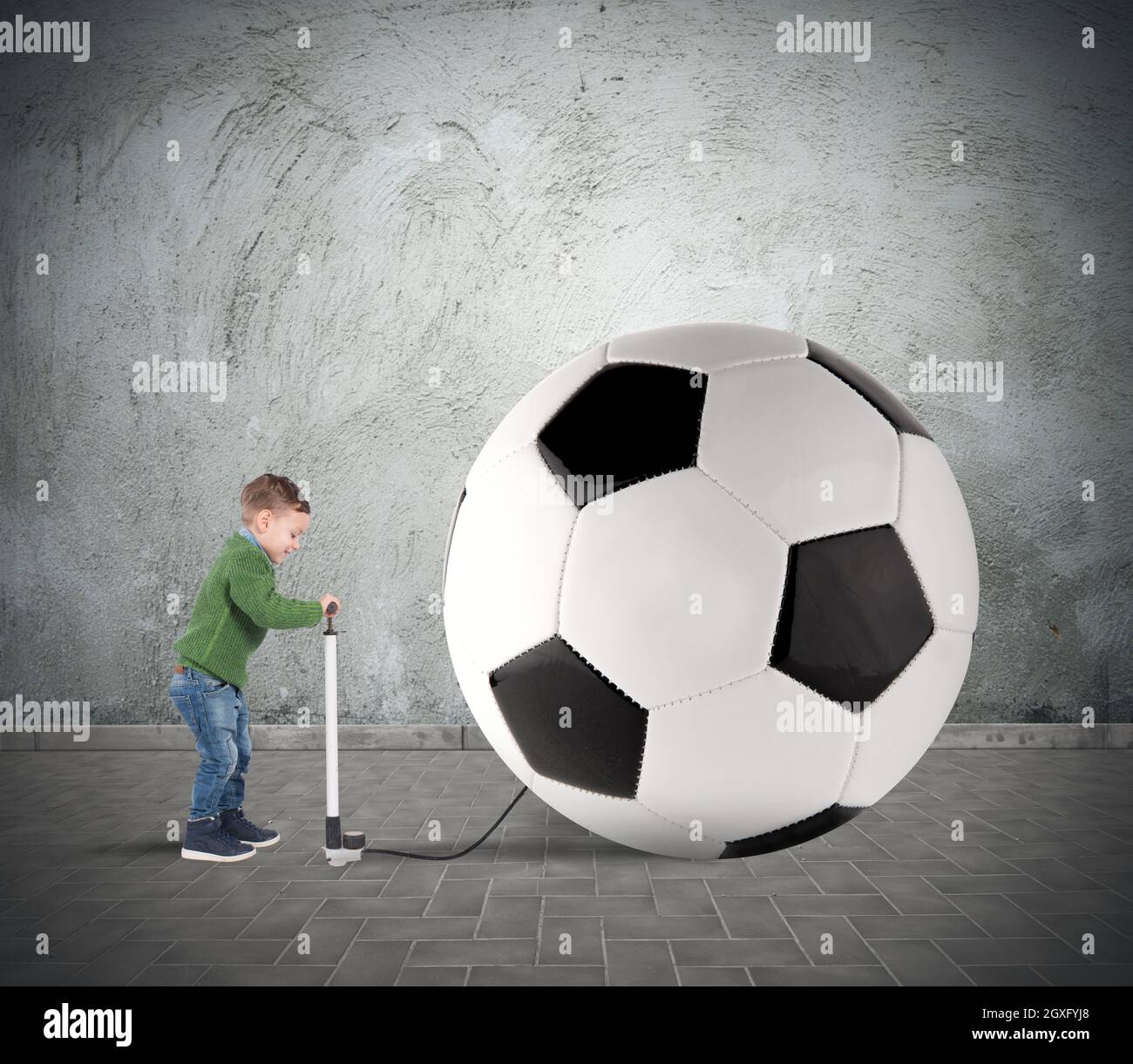 Baby boy amused swollen a big soccer ball Stock Photo Alamy