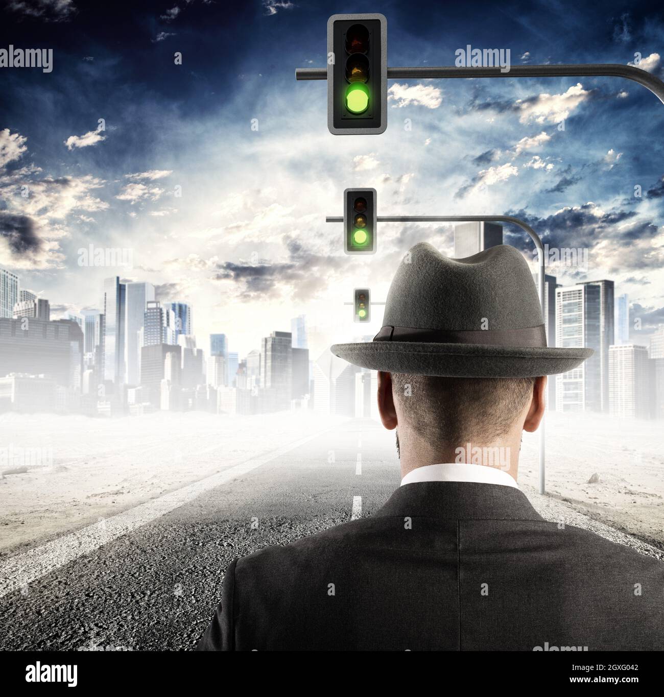Man walking on street with traffic lights Stock Photo - Alamy