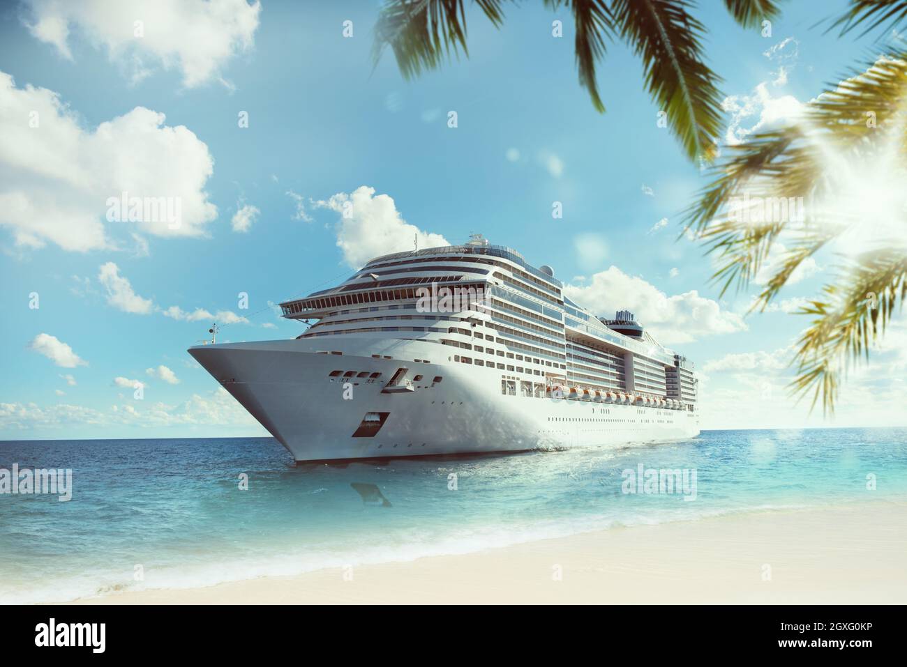 Cruising at sea near a tropical beach Stock Photo - Alamy