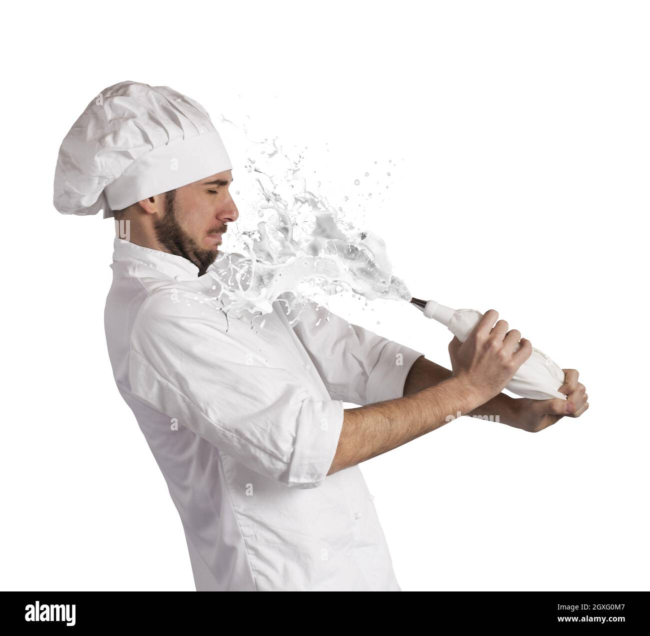 Chef splashed by the cream for garnish Stock Photo - Alamy