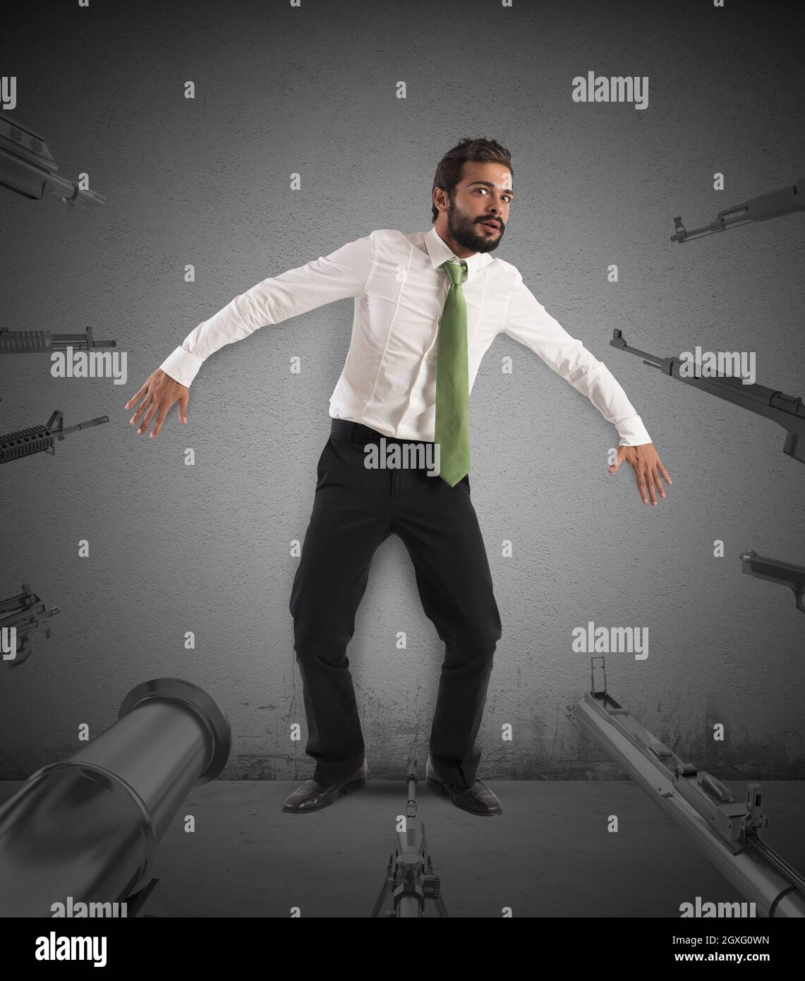 Guns trained on a man very scared Stock Photo Alamy