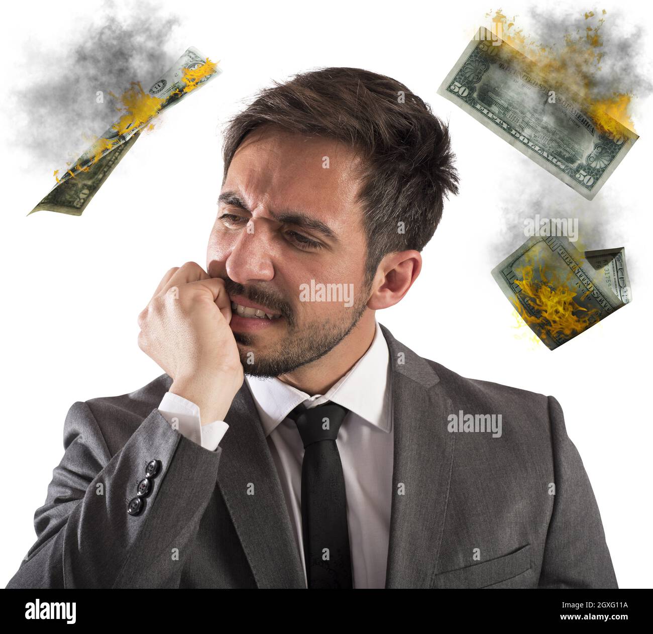 Angry businessman with money which are flammable Stock Photo - Alamy
